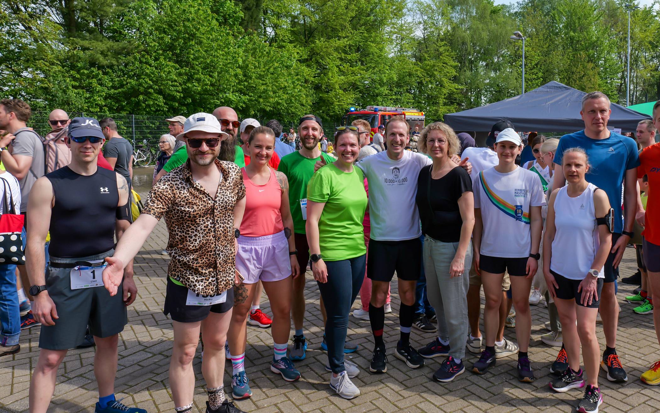 Laura Hayen von me-sport (in grün) mit Laufexperte Jan Fitschen und Bürgermeisterin Sandra Pietschmann. 